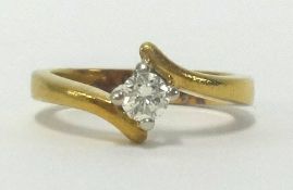 An 18ct gold diamond solitaire ring, finger size O.