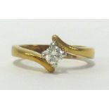 An 18ct gold diamond solitaire ring, finger size O.