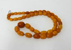 Amber beads, 82.90gms.