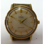 Omega Seamaster, a gents 9ct gold cased wristwatch, Automatic, with gold Milanese bracelet.