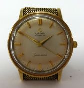 Omega Seamaster, a gents 9ct gold cased wristwatch, Automatic, with gold Milanese bracelet.