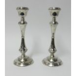 A pair of silver candlesticks, height 26cm.