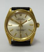 Rolex, a gents 18ct gold Oyster Perpetual Chronometer wristwatch, with leather strap, green box