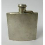 A silver and engine turned hip flask, approx 4.50oz.