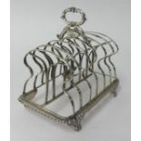A George III silver six division toast rack circa 1820, approx 9.67oz.