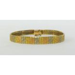 An 18ct three colour gold bracelet, approx 17.6gms.