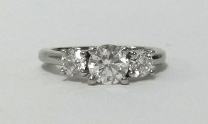 Rare Pink, a good three stone diamond graduated ring, set in platinum, finger size H, with GIA
