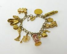 A 9ct gold charm bracelet, approx 36gms.