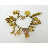 A 9ct gold charm bracelet, approx 36gms.