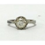 Solitaire diamond ring, only slightly off round modern brilliant cut diamond,