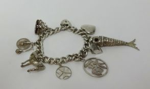 A silver charm bracelet, approx 65gms.