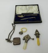 Mixed lot, silver vesta, guard chain, three teethers/rattles, cased silver, spoon and pushers.