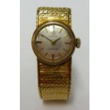 Omega, a ladies 9ct gold cased 'Ladymatic' wristwatch with gold bracelet.
