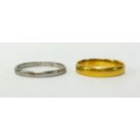 A 22ct gold wedding band (4gms), also a platinum band 3.4gms (2).