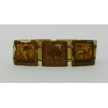 A bone bracelet with painted oriental panels of figures and scenes, comprising of seven links,