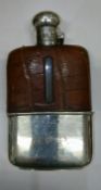 Sillver mounted bayonet top and glass, leather bound hip flask,