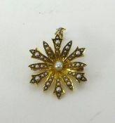 Unhallmarked yellow metal (tested to 15ct quality) and oriental pearl single flower