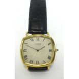 Cartier, a gents 18ct gold automatic wristwatch, the engine turned dial set with roman numerals on a