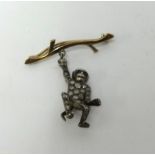 A diamond set monkey charm.