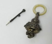 A Victorian silver baby's teether and rattle (damaged) also a propelling pencil.