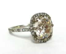 A fine diamond ring, set with an old European cut diamond, with copy of insurance