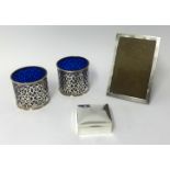 A silver rectangular photo frame 20cmx 12cm, together with square cigarette box and a pair of silver