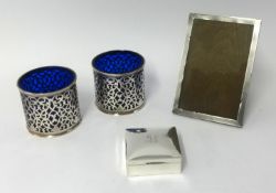 A silver rectangular photo frame 20cmx 12cm, together with square cigarette box and a pair of silver