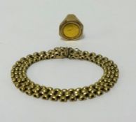 A 9ct gold bracelet approx 20gms, also 1/10 cru gram gold coin set within a 9ct ring (total weight