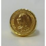 A yellow metal ring set with a gold coin, total weight 22.50gms.