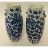 A pair of blue and white oriental porcelain vases, height 20cm