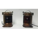 A pair of brass and copper ship starboard and port lamps, the handle stamped IP56, height 37cm