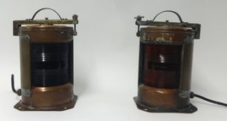 A pair of brass and copper ship starboard and port lamps, the handle stamped IP56, height 37cm