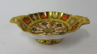 A small Royal Crown Derby porcelain and gilt pattern shallow stem dish.