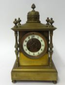 A Victorian brass cased mantle clock, with 8 day striking movement, height 33cm.