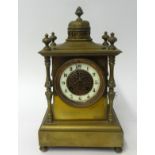 A Victorian brass cased mantle clock, with 8 day striking movement, height 33cm.