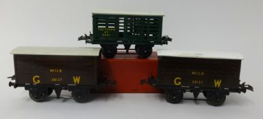 Two Hornby gauge O (Great Western Railway) milk traffic vans and a boxed No1 (Southern) Railway milk
