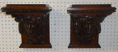 A pair well carved 19th century mahogany wall brackets. each having a detachable top, height 30cm,