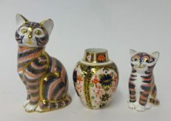 Royal Crown Derby cat paperweight (lacks stopper), another smaller cat paperweight and a Derby