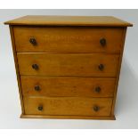 A pine four drawer cabinet, from a Shoe Shop, 'Badminton Original Laces', height 37cm.