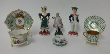 A pair of 19th Century pottery figures, height 16cm, a 19th Century continental cabinet cup and