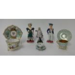 A pair of 19th Century pottery figures, height 16cm, a 19th Century continental cabinet cup and