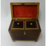 A 19th Century rosewood and cross banded tea caddy with brass feet and ivory escutcheon, width