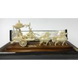 An antique Indian carved ivory chariot