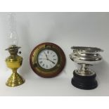 A modern marine wall clock, a brass oil lamp and a good quality silver plated rose bowl