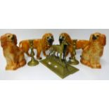 A pair of 19th Century pottery standing lions also a pair of Staffordshire spaniel dogs, a pair of