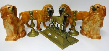 A pair of 19th Century pottery standing lions also a pair of Staffordshire spaniel dogs, a pair of