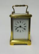French brass cased carriage clock, fitted keywind, height 17cm handle up, running