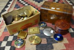 A collection of compacts and a Victorian parquetry inlaid sewing box.