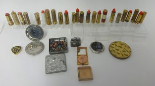 Collection of mixed lipsticks, compacts and lighter etc
