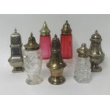 Collection of sugar shakers including two cranberry coloured (7)